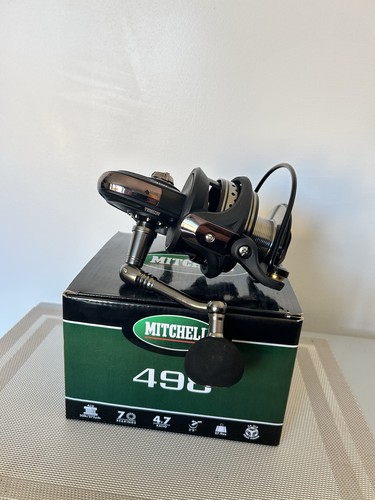 Mitchell 498 reel mint - in,