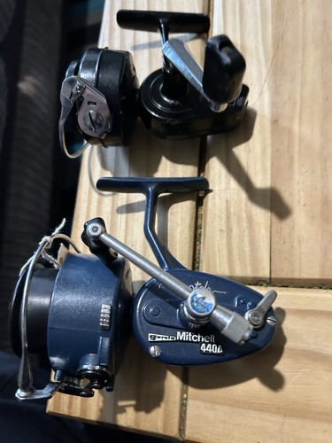 Two mitchell reels - two, a